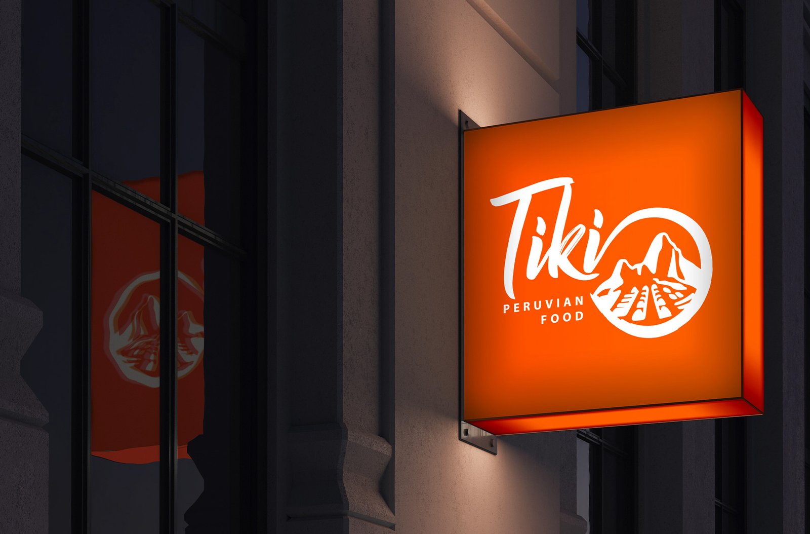 Letreiro luminoso laranja com a identidade visual do restaurante Tiki